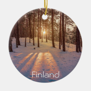 Sunset in snowy winter pine forest ceramic ornament