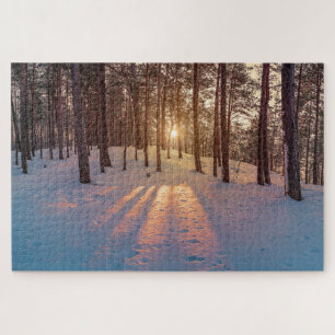 Sunset in snowy winter pine forest jigsaw puzzle