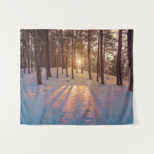 Sunset in snowy winter pine forest tapestry
