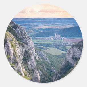 Sunset in the mountains classic round sticker