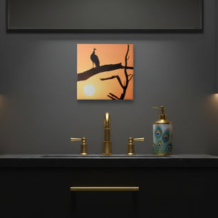 Sunset Majesty: Peacock Silhouette Ceramic Tile