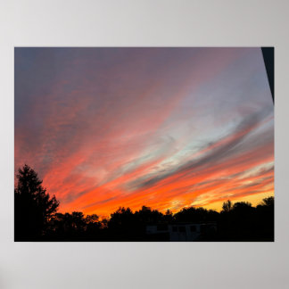 Sunset over a field poster