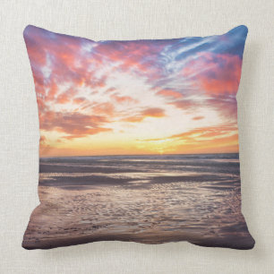 Sunset over beach and sea cushion