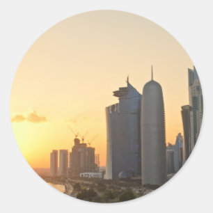 Sunset over Doha, Qatar round sticker