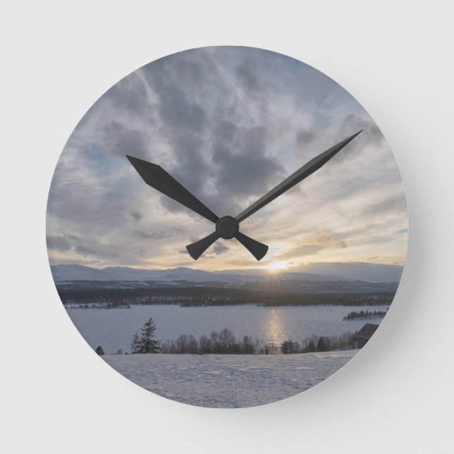 Sunset over frozen lake round clock (Front)
