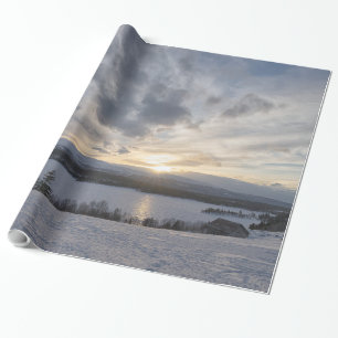 Sunset over frozen lake wrapping paper