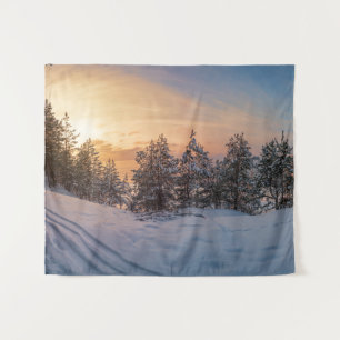 Sunset over frozen snowy forest near sea tapestry