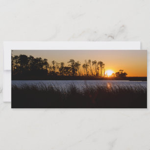Sunset over marshlands holiday card