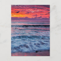 Sunset over ocean waves, California