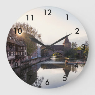 Sunset over old mediaeval bridge in Nuremberg Large Clock