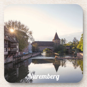 Sunset over old medieval bridge in Nuremberg Coaster
