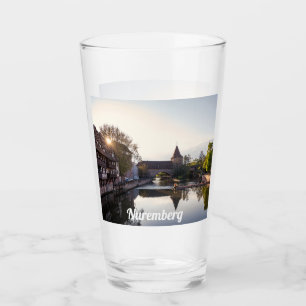 Sunset over old medieval bridge in Nuremberg Glass