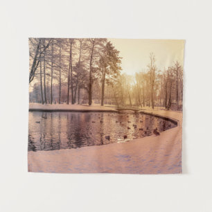 Sunset over park with small frosty lake tapestry
