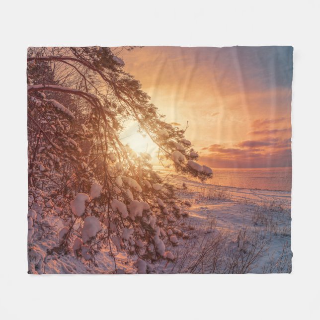 Sunset over sea and snowy pine tree fleece blanket (Front (Horizontal))