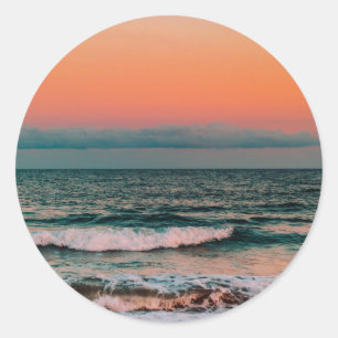 sunset over sea classic round sticker