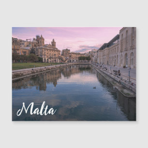 Sunset over small canal in Cospicua, Malta