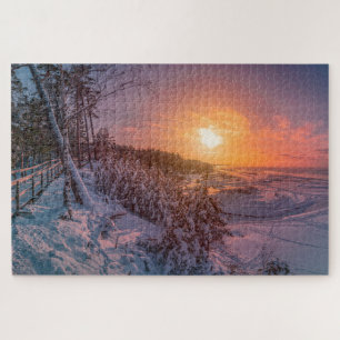 Sunset over snow sea coast jigsaw puzzle