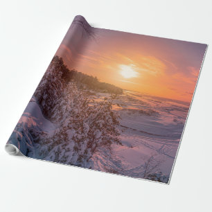Sunset over snow sea coast wrapping paper