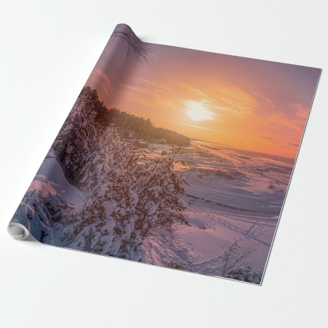 Sunset over snow sea coast wrapping paper (Unrolled)