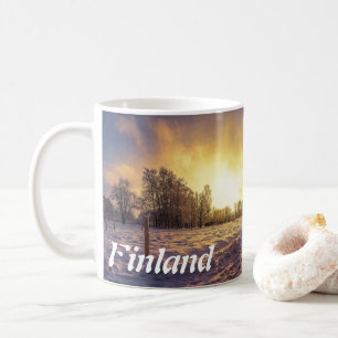 Sunset over snowy winter park coffee mug