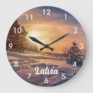 Sunset over snowy winter sea coast large clock