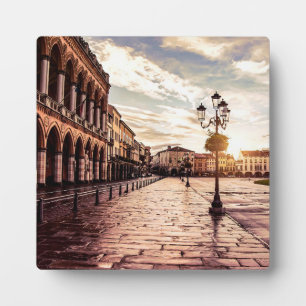 Sunset over square in Padova in Italy Plaque