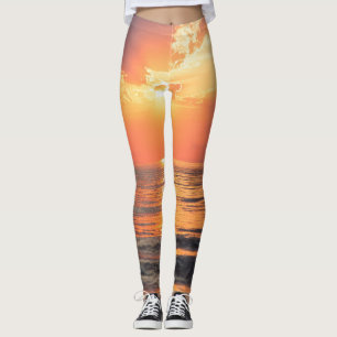 sunset over water leggings