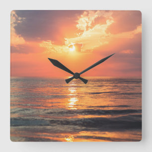 sunset over water square wall clock