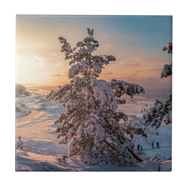 Sunset over winter snowy sea coast ceramic tile (Front)