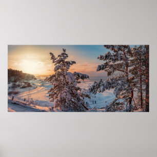 Sunset over winter snowy sea coast poster