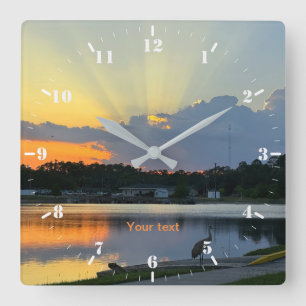 Sunset reflection and birds silhouettes square wall clock
