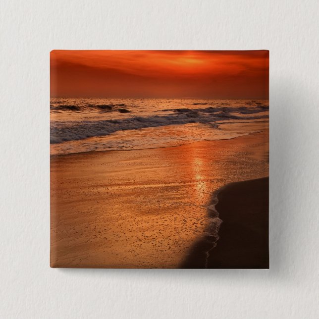 Sunset reflections off clouds and ocean shore 15 cm square badge (Front)