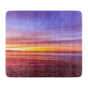 Sunset Sky over Beach and Sea Cutting Board