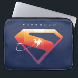 Sunset Soar Superman Shield Laptop Sleeve<br><div class="desc">Add a cosmic twist to your superhero style with this radiant Superman design! Set against a deep navy backdrop, the classic “S” shield glows in a warm gradient of fiery orange, golden yellow, and sunset pink—capturing the beauty of Superman’s power and hope. A silhouette of Superman streaks across the emblem...</div>