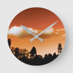 Sunset trees round clock