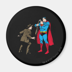 Superman bends a gun magnet