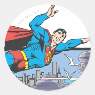 Superman Flies Thru City Classic Round Sticker