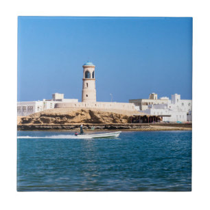 Sur Lighthouse with fisherman boat - Sur, Oman Ceramic Tile