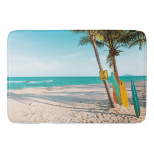 Surf boards on beach throw pillow bath mat