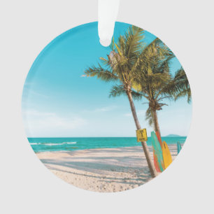 Surf boards on beach throw pillow ornament