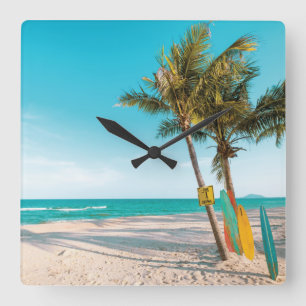 Surf boards on beach throw pillow square wall clock
