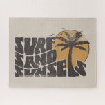 Surf Sand Sunsets Beach Life Palm Tree Jigsaw Puzzle<br><div class="desc">"Surf Sand Sunsets" t-shirt is the perfect addition to your summer wardrobe. Whether you're hitting the waves or just lounging on the sand,  this tee has got you covered. Let’s Get ready for a summer filled with surf,  sand,  and unforgettable sunsets.</div>