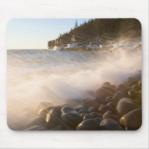 Surf washes over the cobblestones in Monument Mouse Pad