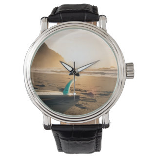 Surfboard watch. Sunset, beach, sea Watch