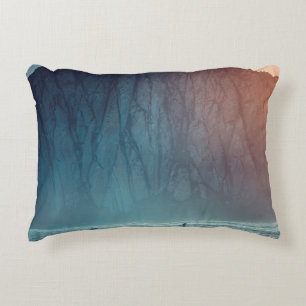 SURFER ON BODY OF WATER NEAR SEA CLIFF DURING DAYT DECORATIVE CUSHION
