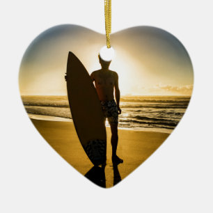 Surfer silhouette during sunrise ceramic ornament