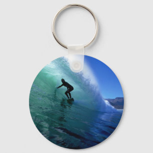 Surfer surfing the tube in green wave key ring