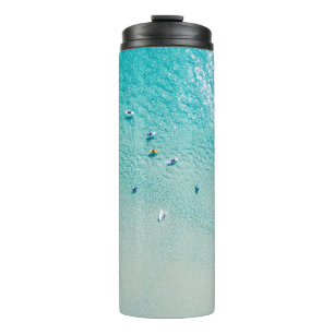 Surfers aerial view, clear ocean. thermal tumbler