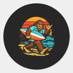 Surfing bigfoot retro sunset beach tropical beach classic round sticker