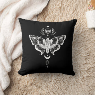 Surreal dark skull moth cushion